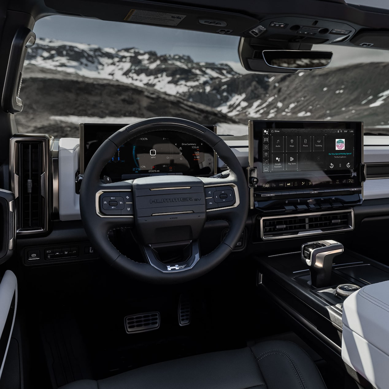 Interior View of the Steering Wheel and Infotainment Screen in the GMC HUMMER EV SUV