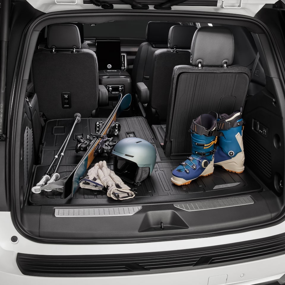 Skiing Gear in the Interior Cargo Space of a GMC Vehicle