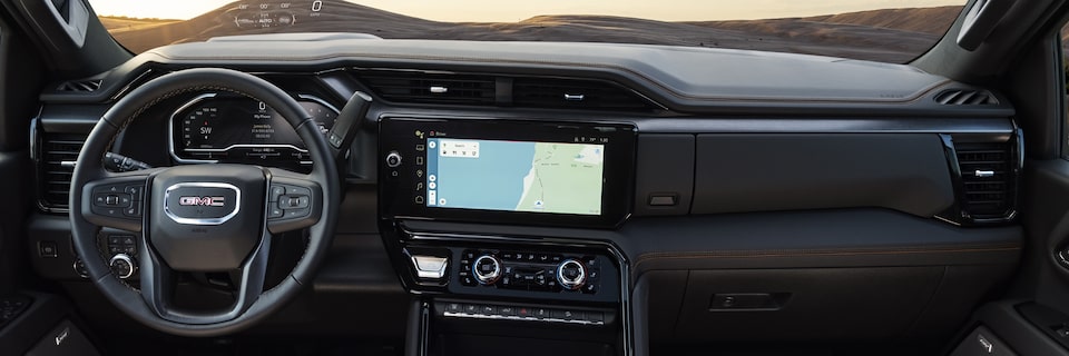 Interior View of a GMC Truck's Steering Wheel and Dashboard