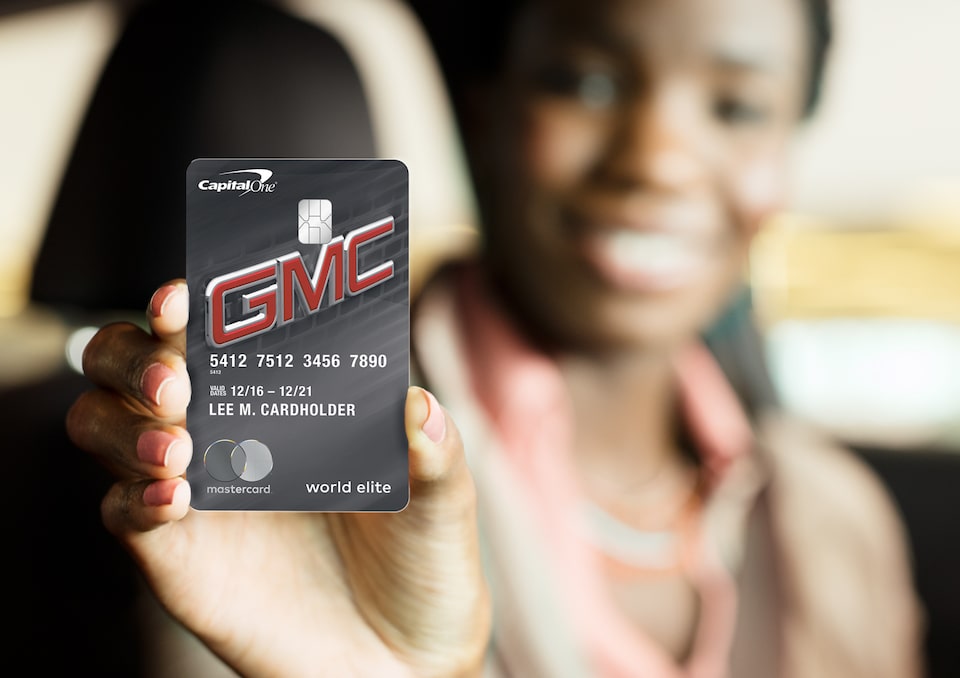 Image of the GMC BuyPower Card being held by a person with the card in focus.