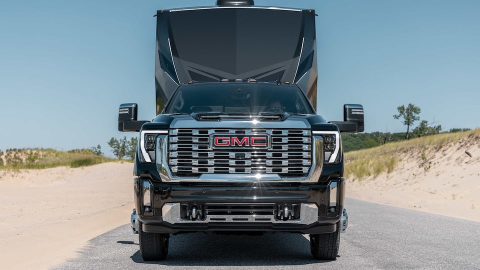 2023 GMC Sierra HD Diesel pulling Camper on Mountainside