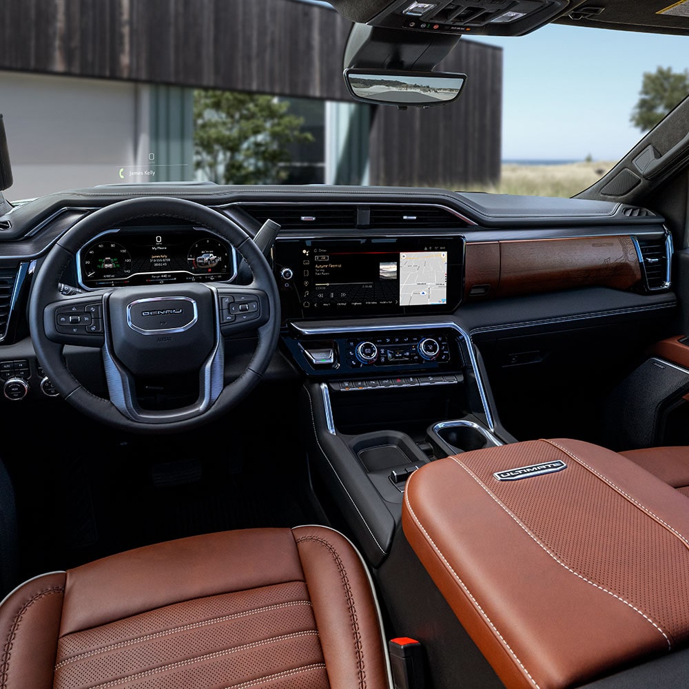 Interior View of the Steering Wheel, Dashboard, and Infotainment Screen in the GMC Sierra Pickup Truck