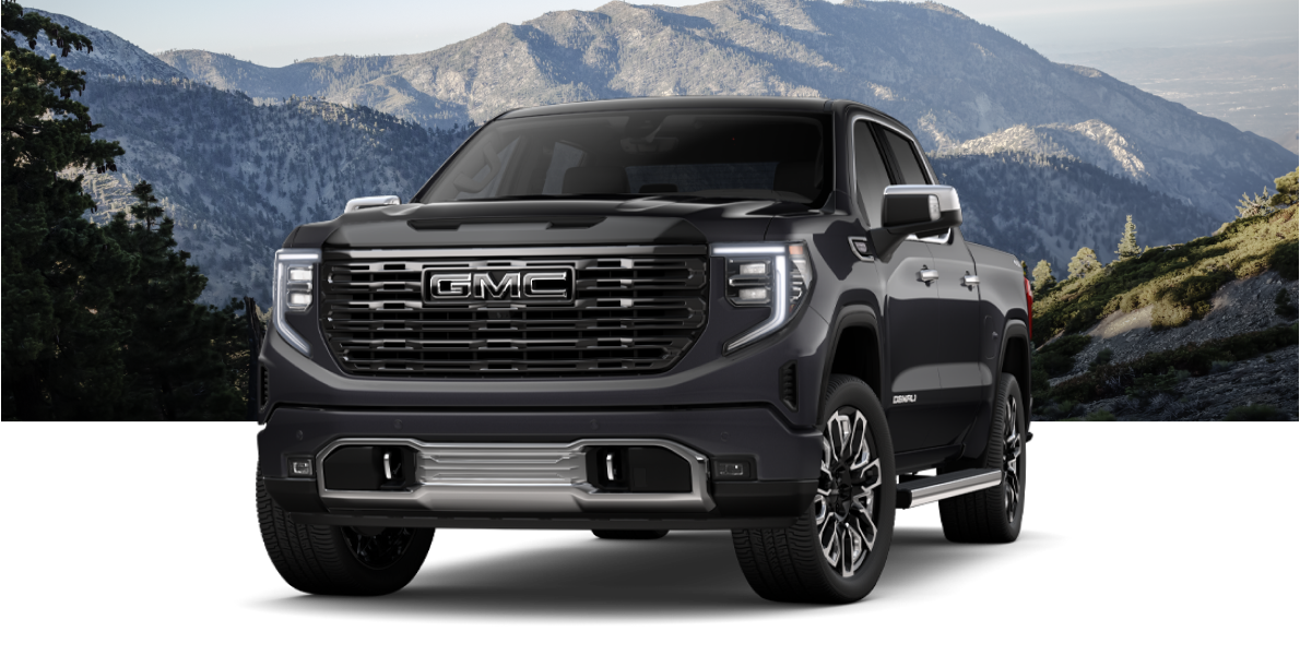 Three-Quarters Front View of a Black Sierra 1500 Denali Ultimate Truck