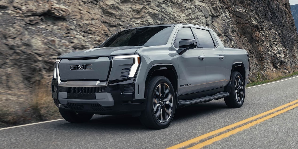 The GMC Sierra EV Driving up a Mountain Road