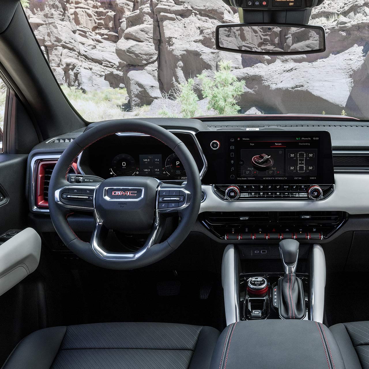 Interior View of the Steering Wheel and Infotainment Screen in the GMC Canyon Pickup Truck