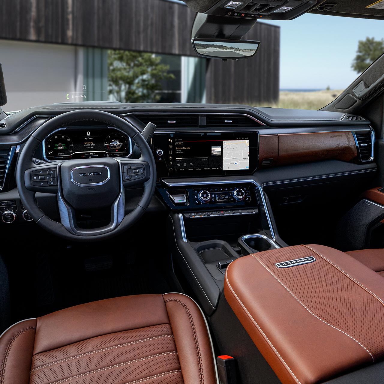 Interior View of the Steering Wheel and Infotainment Screen in the GMC Sierra HD Pickup Truck