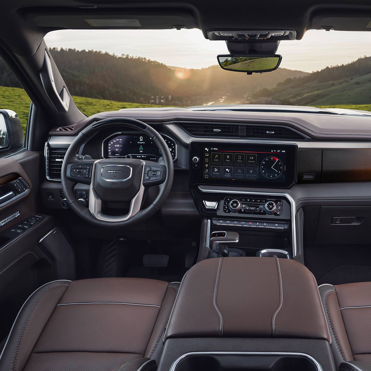 Interior View of the Steering Wheel and Infotainment Screen in the GMC Sierra 1500 Full-Size Truck