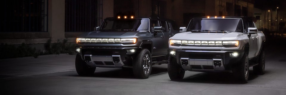 GMC HUMMER EVs electric truck and electric SUV parked side by side