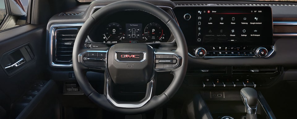 Close-up of the Canyon Elevation Steering Wheel and Infotainment System