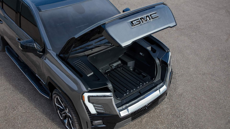 Close-up View of the 2025 GMC Sierra EV Rear  Open eTrunk