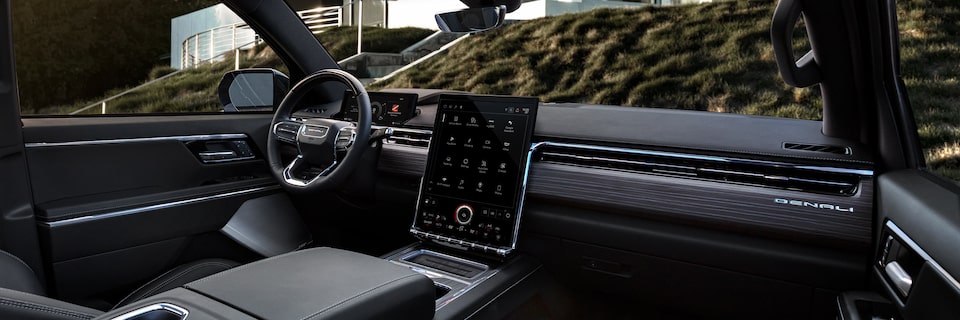 The 2025 GMC Sierra EV Pickup Truck Interior Dashboard and Steering Wheel